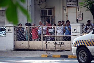 Local residents wait for Obama