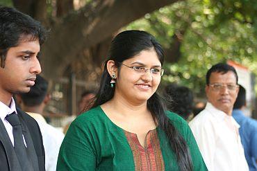 Students arrive at the St Xavier's College in Mumbai before their interaction with President Obama