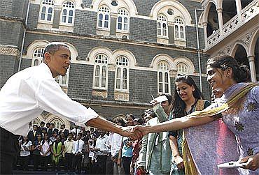 President Obama greets students after the townhall meeting