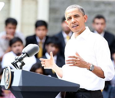 US President Barack Obama interacts with students at St Xavier's College in Mumbai
