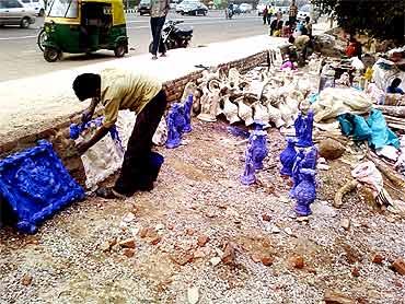 The sculptors allege that the police harassed them and destroyed their creations