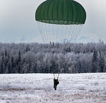 An Indian soldier prepares to land at Malamute drop-zone