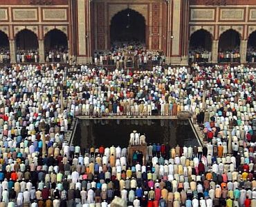 Muslims perform the Eid al-Adha prayers at the Jama Masjid in Old Delhi