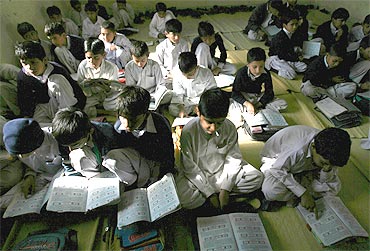Students inside the classroom of a school in Jamaat-ud-Dawa's headquarters