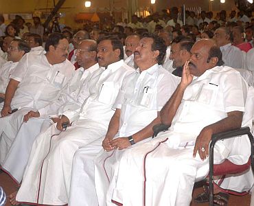 Former Telecom minister A Raja is seen sitting with fellow DMK leaders