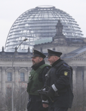 Policemen patrol near the Bundestag