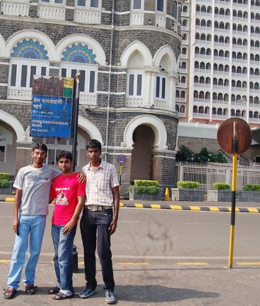 From left: Rajesh Tubati, Madan Kumar and Jaya Kumar outside Hotel Taj