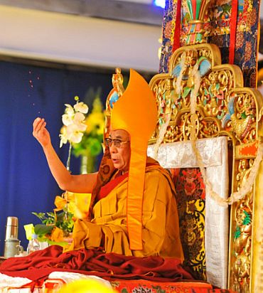 The Dalai Lama performs a prayer in Dharamsala, where he lives