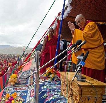 The Dalai Lama greets Tibetan exiles