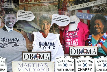 Cutouts of US President Barack Obama, former Alaska governor Sarah Palin and Michelle Obama