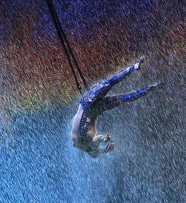 A performer takes part in a show 'The House of Dancing Water' at the City of Dreams resort in Macau on September 15, 2010. The 256 million dollar water-based show, created and directed by Franco Dragone, is inspired by the 'seven emotions' principle derived from classical Confucian beliefs in Chinese culture