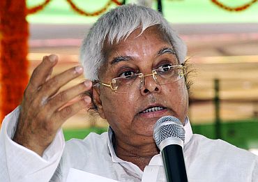 Lalu Prasad Yadav speaks during a meeting with his party workers