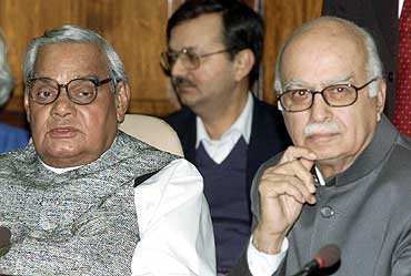 Former PM Vajpayee (left) and then home minister Advani attend a meeting in New Delhi in Feb' 02