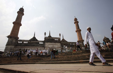 Muslims leave after Friday prayers at a mosque in Lucknow