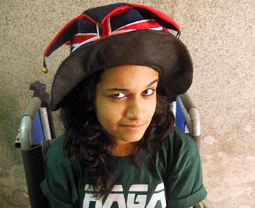 Antara, in a wheelchair, at her college fest