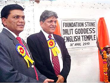 Chandrabhan Prasad, right, at the foundation laying ceremony of the temple to Goddess English