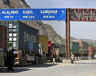 Trucks carrying NATO supplies wait in line at the Pakistan-Afghan border area of Torkham