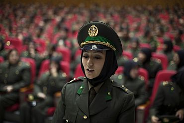 A newly graduated soldier from the Afghan National Army attends a graduation ceremony in Kabul