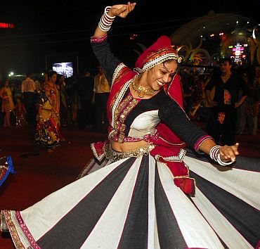 A young woman takes part in Garbha celebrations in Mumbai
