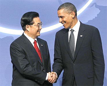 US President Barack Obama greets China's President Hu Jintao