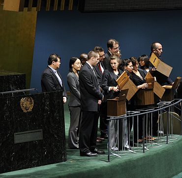 Tellers stand ready to collect ballots for the election by the General Assembly of five new non-permanent members to the Security Souncil