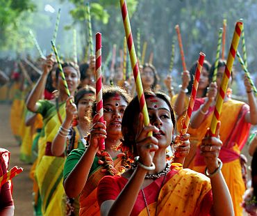 Students dance during Basanta Utsab celebrations in Shantiniketan