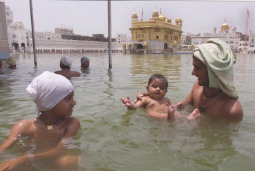Devotees throng the Golden Temple