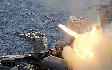A surface-to-air missile is fired from an Indian naval warship during an exercise in the waters of Bay of Bengal