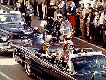 President John F Kennedy, Jacqueline Kennedy  and Texas governor John Connally ride through Dallas moments before Kennedy was assassinated, November 22, 1963