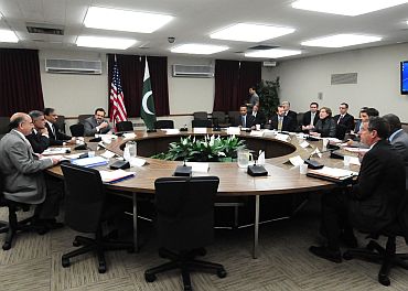 Members of the US-Pakistan Strategic Dialogue Communications Working Group interact at the US Department of State in Washington on October 20. Participants included US Department of Agriculture Deputy Under-Secretary Darcy Vetter, USAID Director Alex Their, Pakistani Minister of Agriculture Nazar Muhammad Gondal and Pakistani Secretary of Agriculture Junaid Iqbal Chowdry