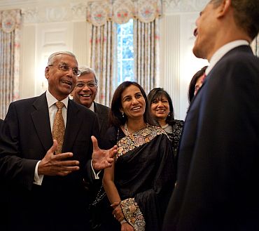 Obama interacts with American and Indian CEOs at the White House