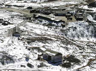A snow-covered army camp is seen after snowfall at the India-China trade route at Nathu-La