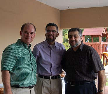Eugene Flinn with Faisal Kaleem (centre) and Nidal (Right)