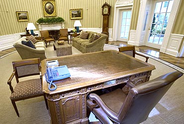 New rug, sofas and wallpaper are part of the redecorated Oval Office