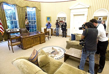 Photojournalists document the newlook Oval Office