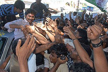 Jagan greets his supporters outside his residence