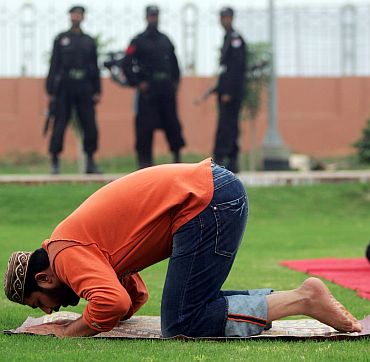 File photo of former Pakistan cricket captain Inzamam-ul-Haq offering prayers in Multan