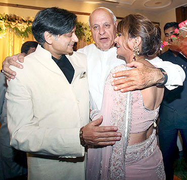 Former chief minister of Jammu and Kashmir and Union minister Farooq Abdullah congratulates the newly weds