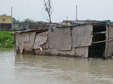 A submerged hut in Asmanpur village, located along the banks of the Yamuna