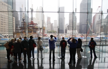 People look over the site of the former twin towers in New York City
