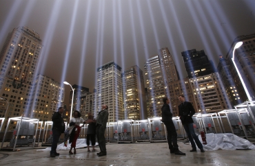 Onlookers stand inside the 'Tribute in Lights in Manhattan'