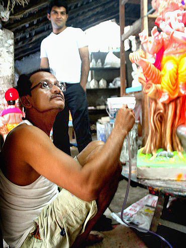 Shekhar Samel at work on an idol