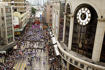 Dragon dancers perform during a parade celebrating Tin Hau festival at Hong Kong