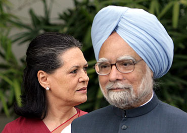 Prime Minister Dr Manmohan Singh and Congress chief Sonia Gandhi attend a news conference in New Delhi