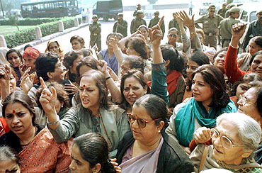Women activists during a protest outside Parliament demanding the introduction of the women's reservation bill