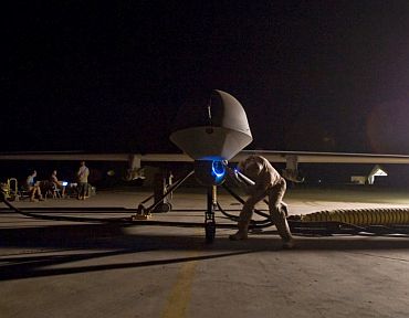 A drone undergoes maintainence procedure at a US base in Afghanistan