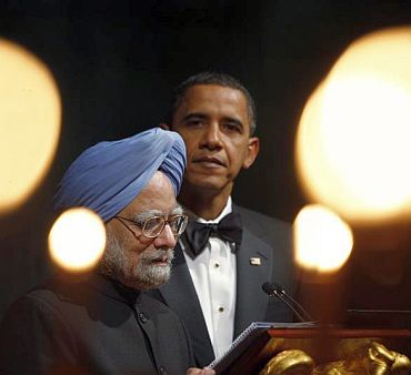 Obama listens to Prime Minister Manmohan Singh's address at the White House last November