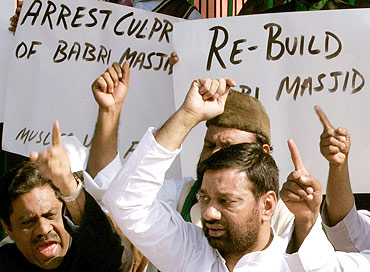 Activists shout slogans during a demonstration in New Delhi