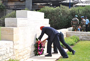 India's Ambassador to Israel Navtej Sarna lays a wreath at the memorial in Haifa