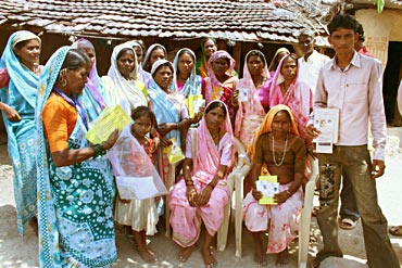 Vasanti Pawar (seated extreme right) and other villagers in Tembhali village